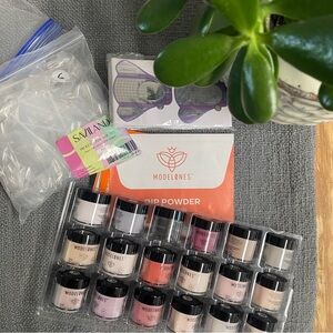 Misc nail supplies. New with tags unopened Modelone and saviland dip and gel